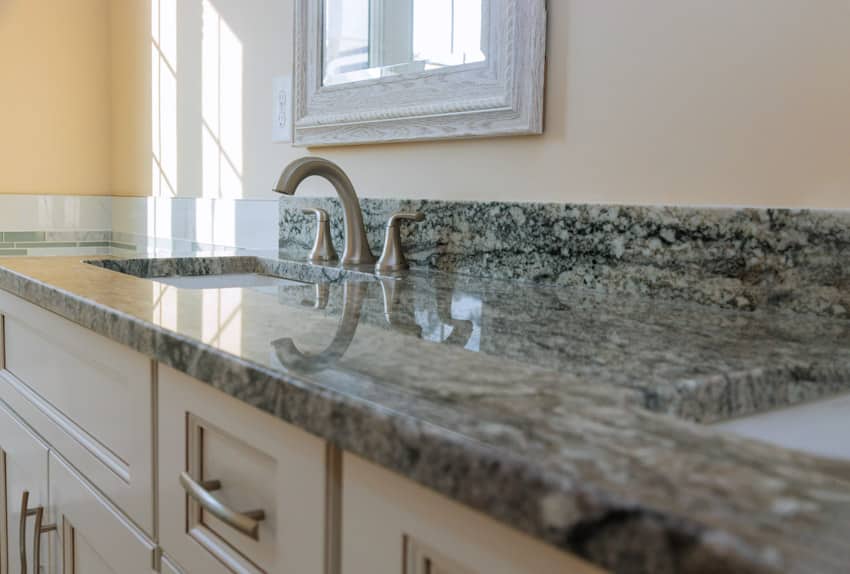 Sealed granite countertop with sink and faucet