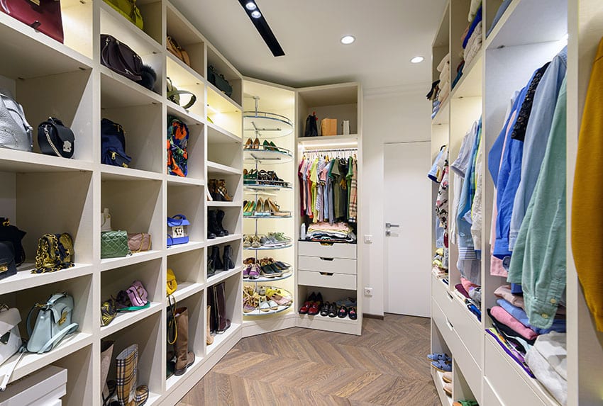 Walk in closet with circular high heel organizer rack