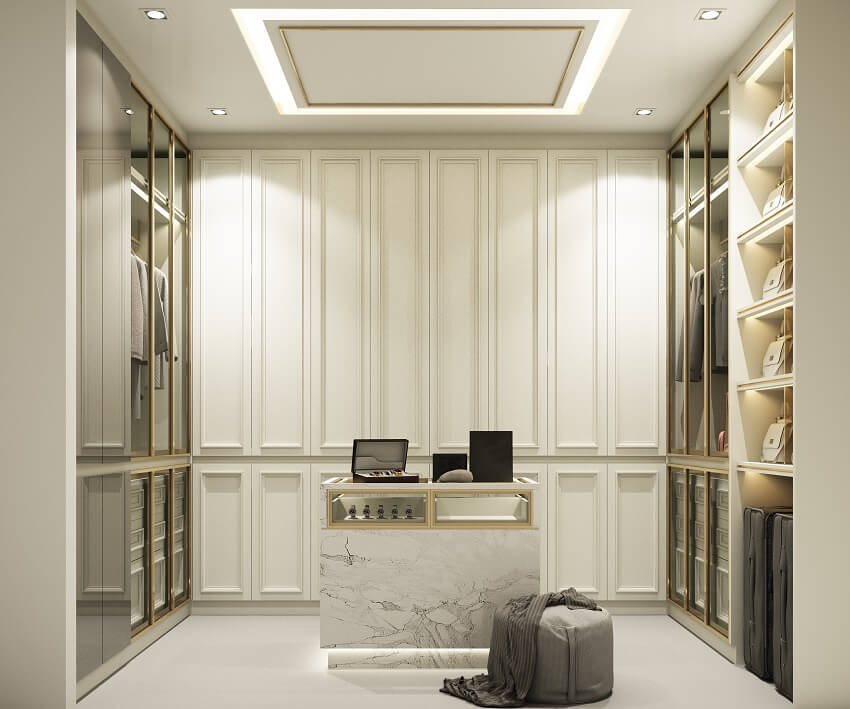 Walk-in closet with LED light in shelves walls with molding, recessed lighting, and marble tile floor