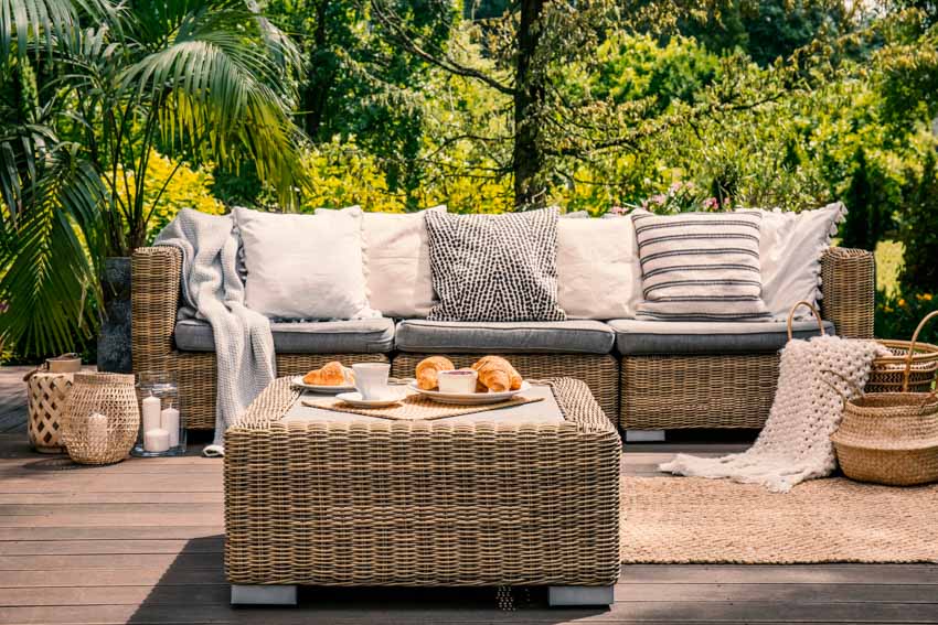Wicker outdoor furniture for patios and gardens with cushions and pillows