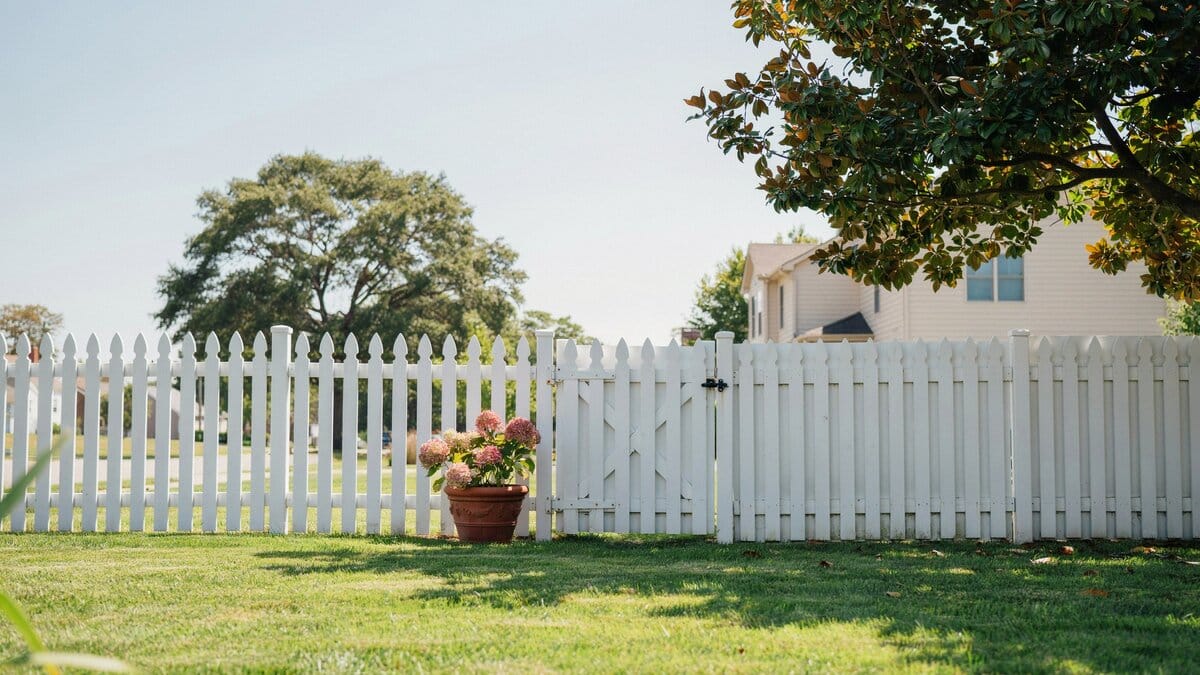 Beautiful white garden fence with a matching entry gate