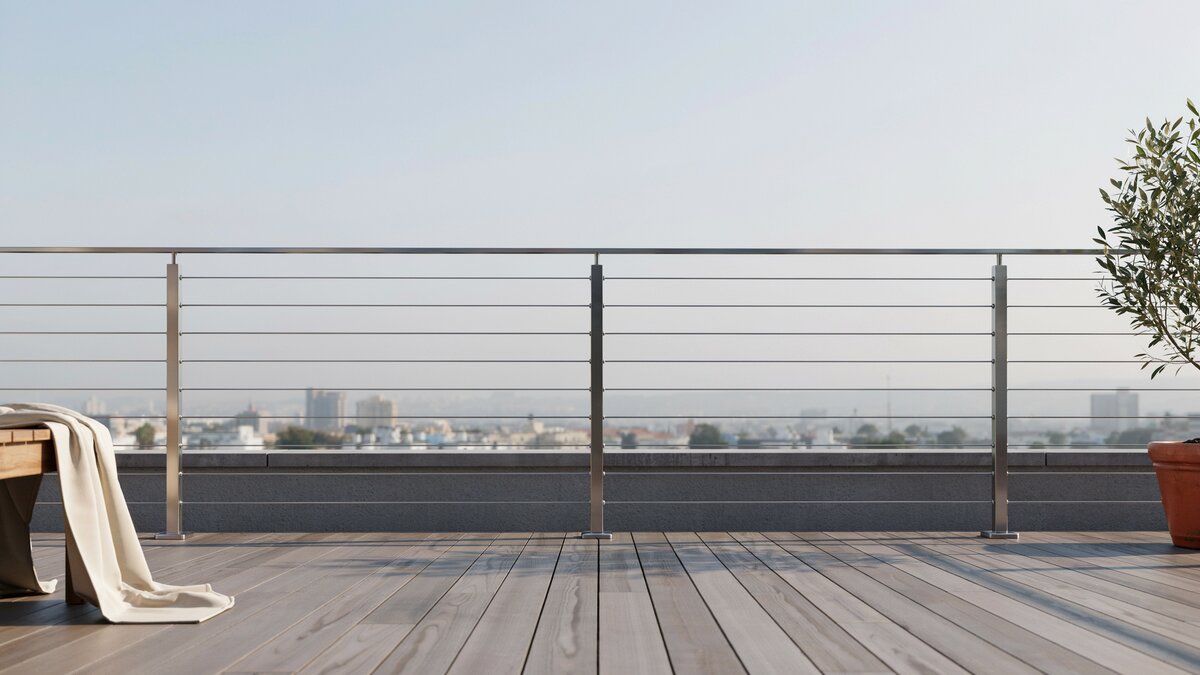 Stainless steel cable and post fence on a balcony patio deck