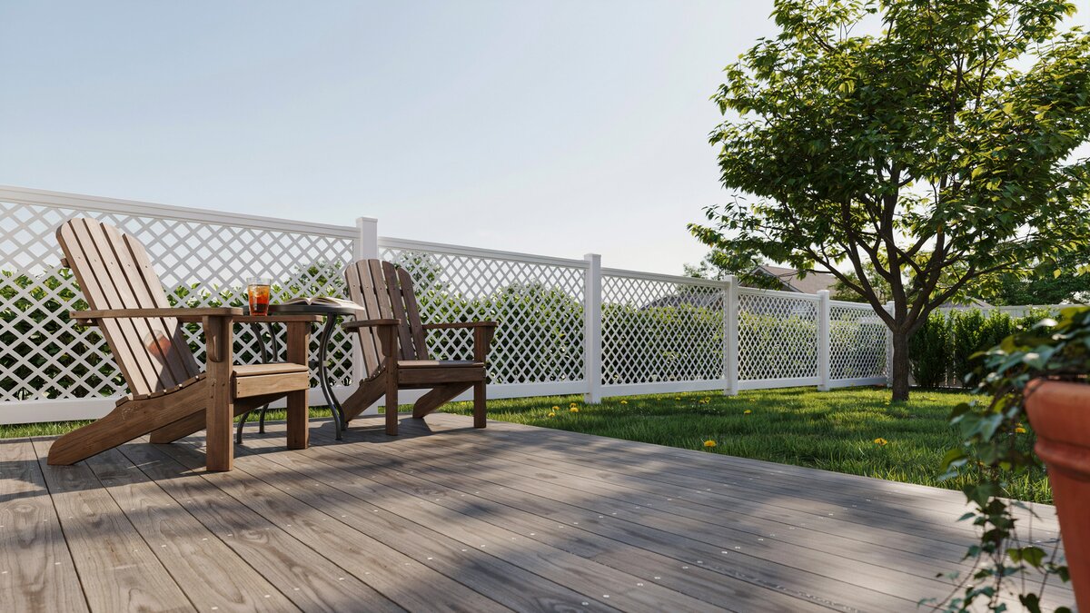 White lattice fence panels enclosing a backyard deck