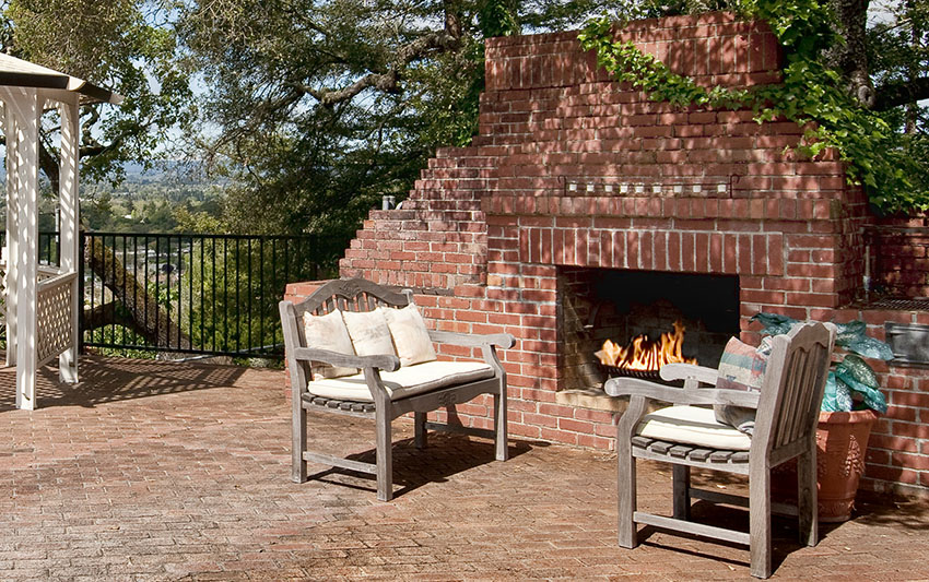 Backyard masonry fireplace