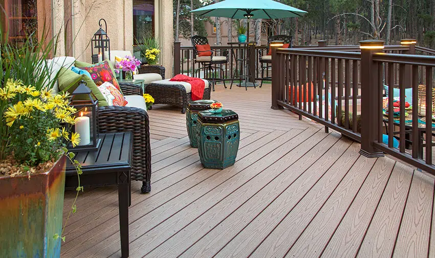 Patio deck with composite decking rattan chairs