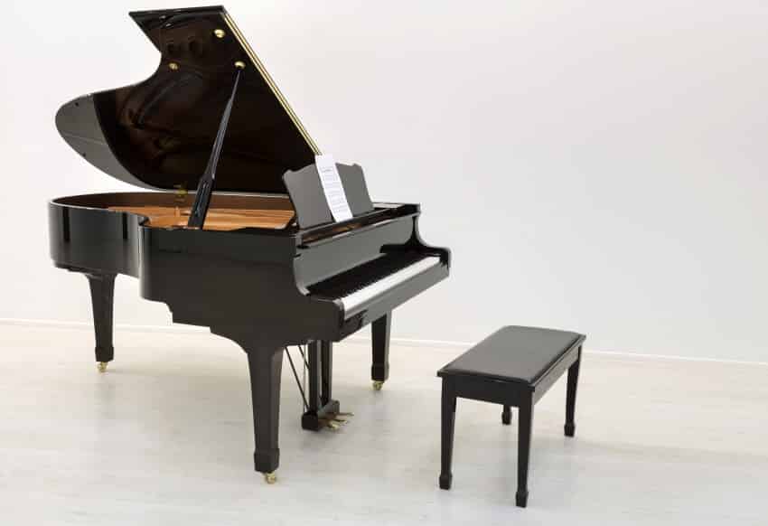 Grand piano in a white room