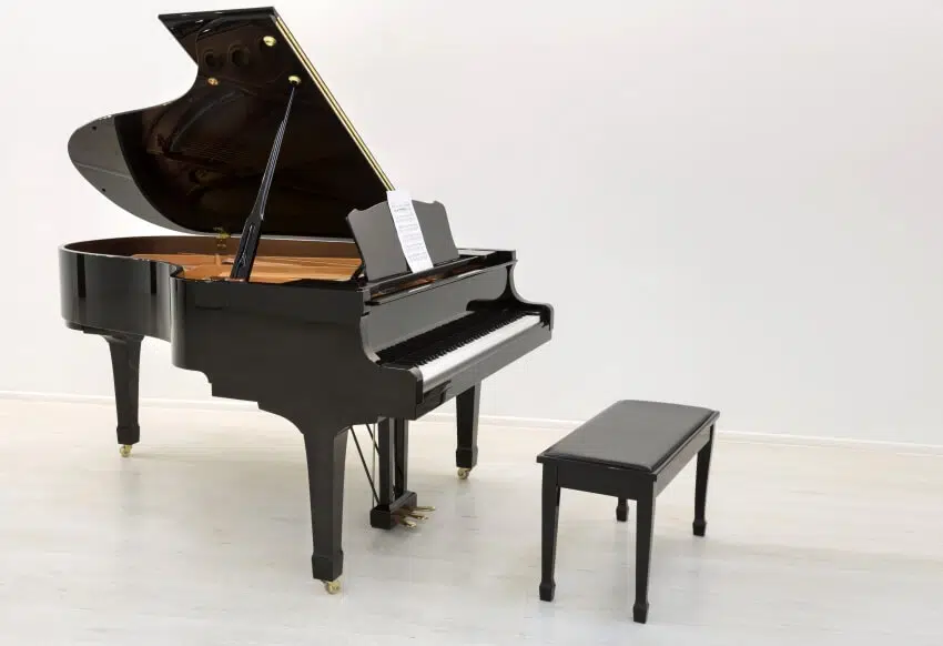 Grand piano in a white room