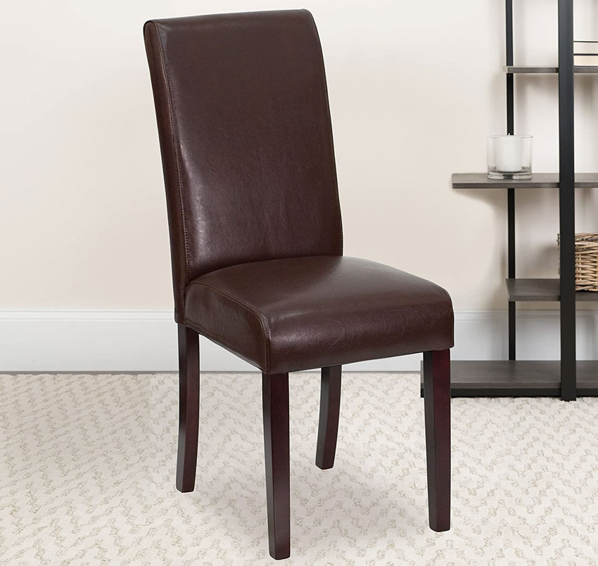 Brown leather parsons chair in living room
