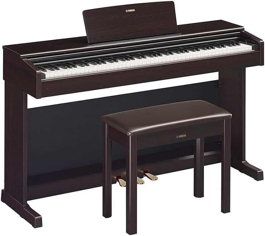 Dark rosewood console piano