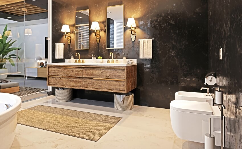 Double wooden washbasin with two mirrors and a sconce on the black marble wall in a bathroom