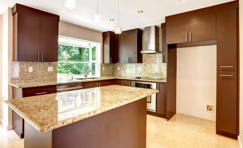 Empty kitchen with matte brown cabinets, granite countertop and backsplash, and marble tile floor