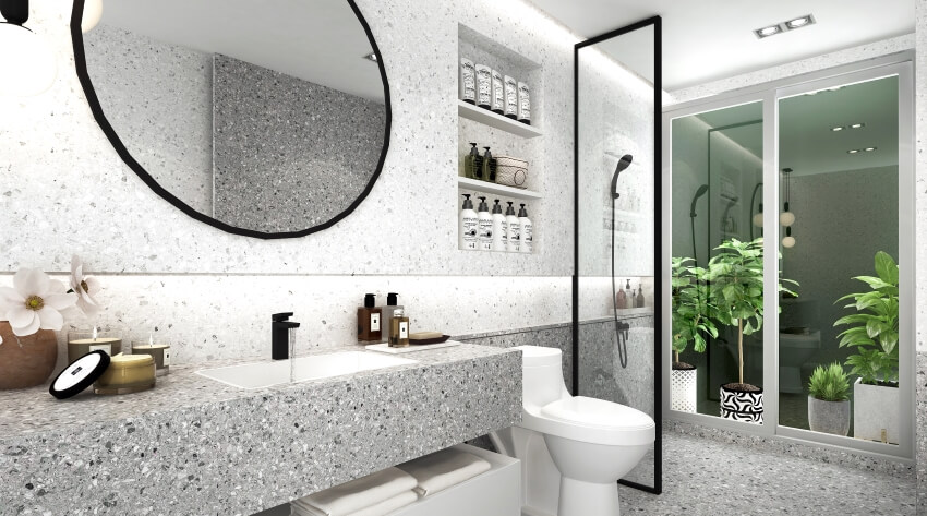 Granite bathroom with plants, shelves, mirror, and floating countertop