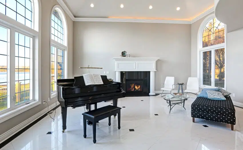 High ceiling living room with piano