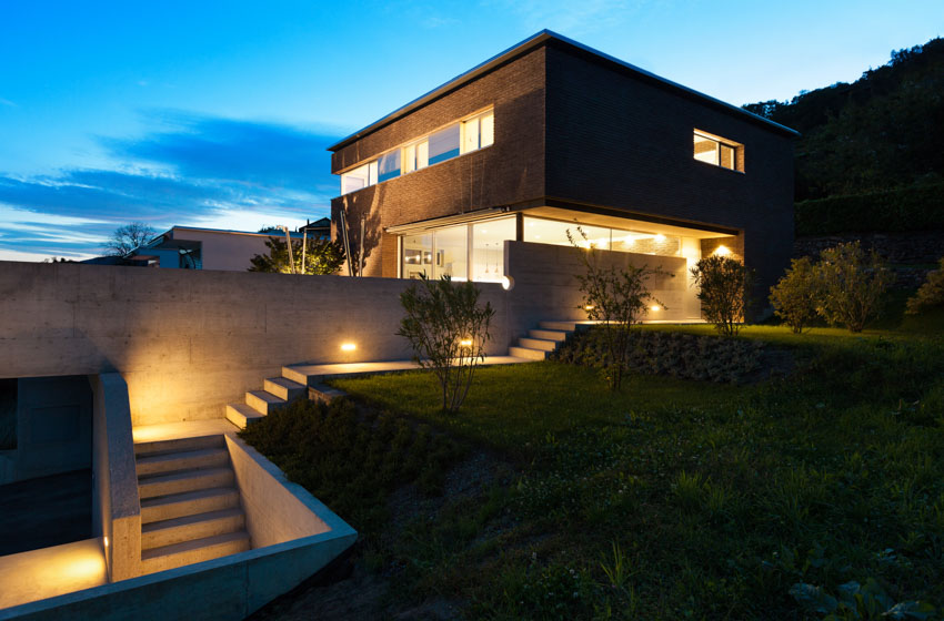 House exterior with landscape lighting fixtures