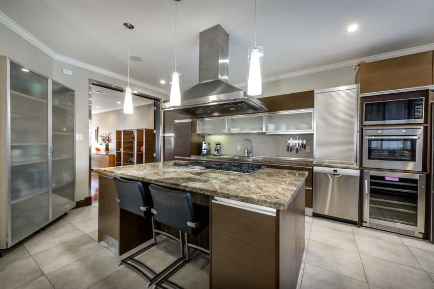 Kitchen Island With Stove Range Hood Tile Flooring And Pendant Lights Is 