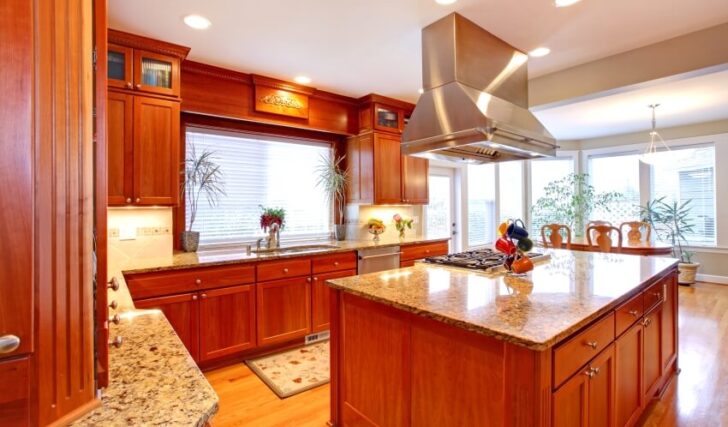 Kitchen Room With Dining Area Granite Countertops Windows And Cherry Wood Cabinets Is 728x427 