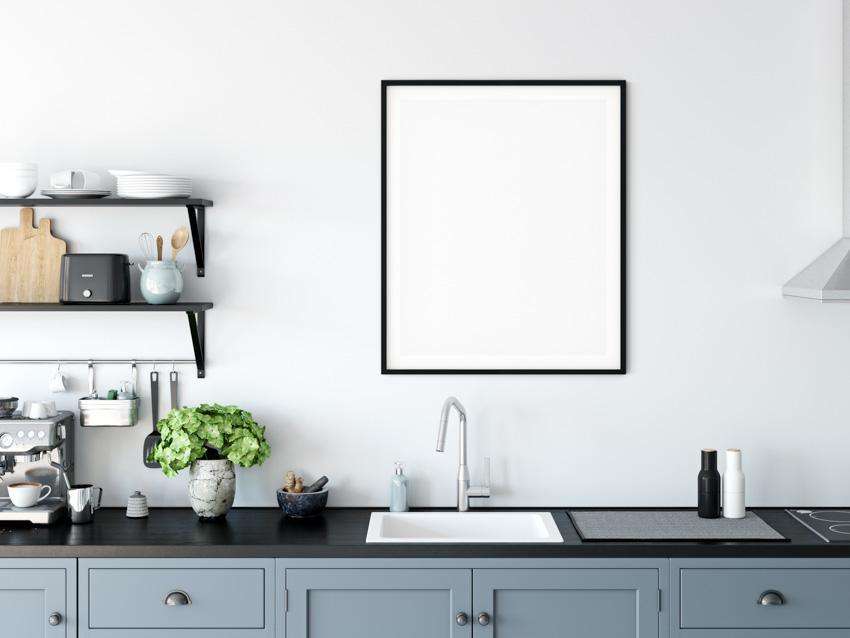 Kitchen with countertop, mat, sink, faucet, and floating shelves