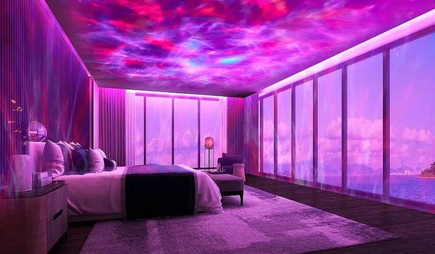 Night light ocean wave projector in bedroom with panoramic windows and king size bed