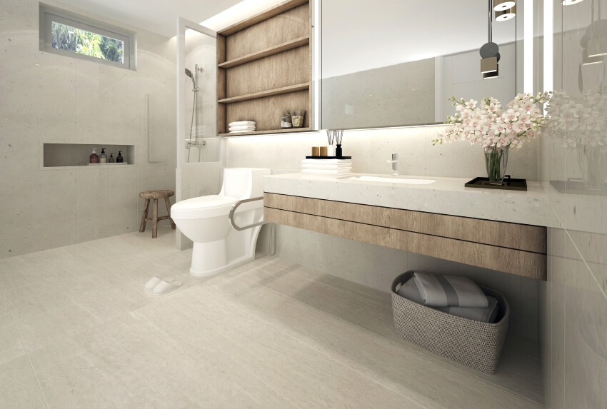 Spacious bathroom interiors with ceramic tile texture wall and a floating quartz countertop