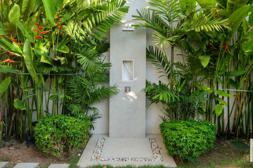 Tropical inspired shower with heliconia flowers 