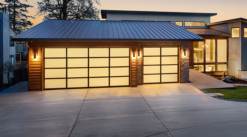 Flat roof house with accent lighting and fiberglass doors