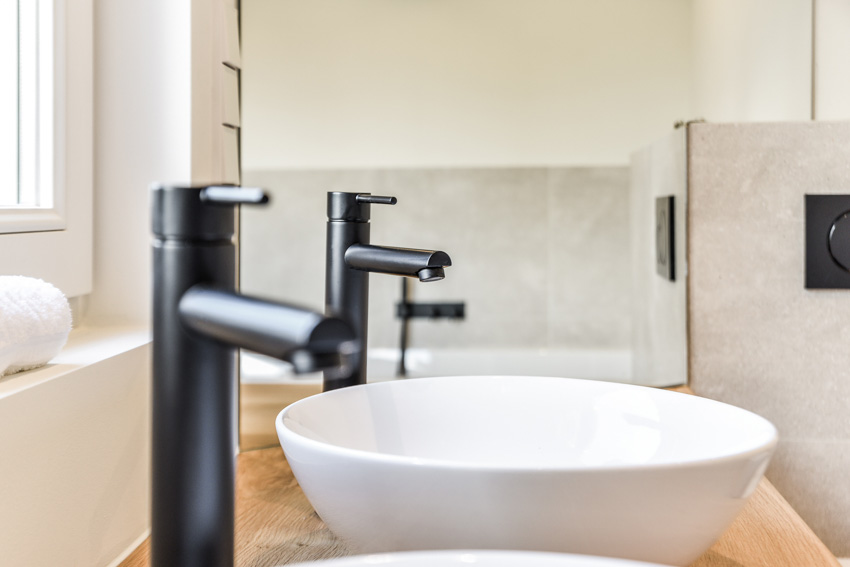 Black twin faucets