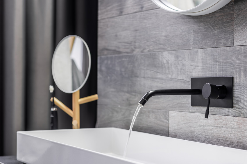 Wall mounted faucet in black finish
