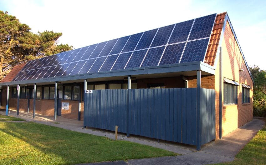 Brick house with solar panels on the roof