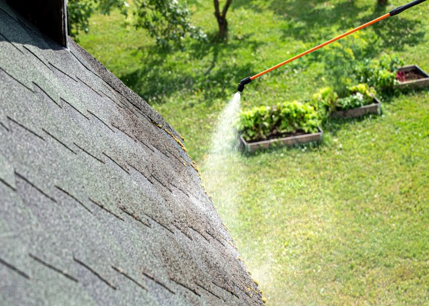 Cleaning roof with pressure washer