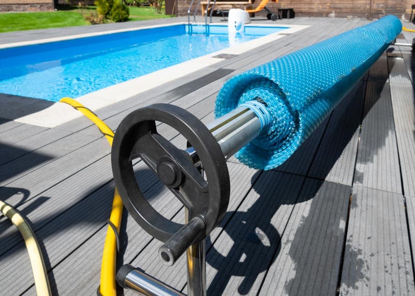Close up image of a covering mechanism for swimming pools