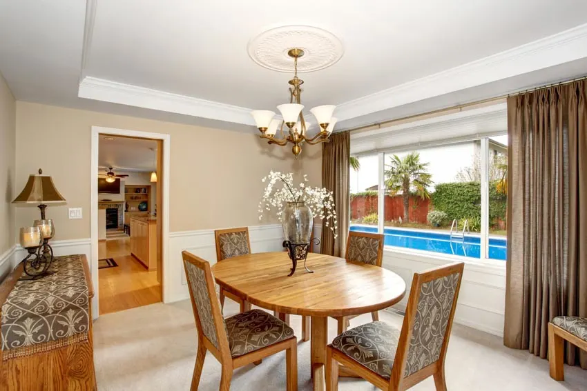 Curtains with grommets, runner of console table and chairs with printed fabric backs