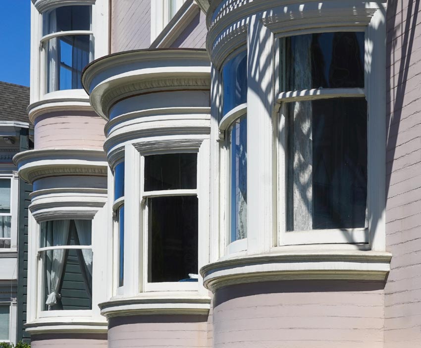 Rows of bow curved windows with white trimmings