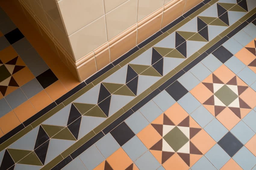 Hallway with encaustic tile flooring