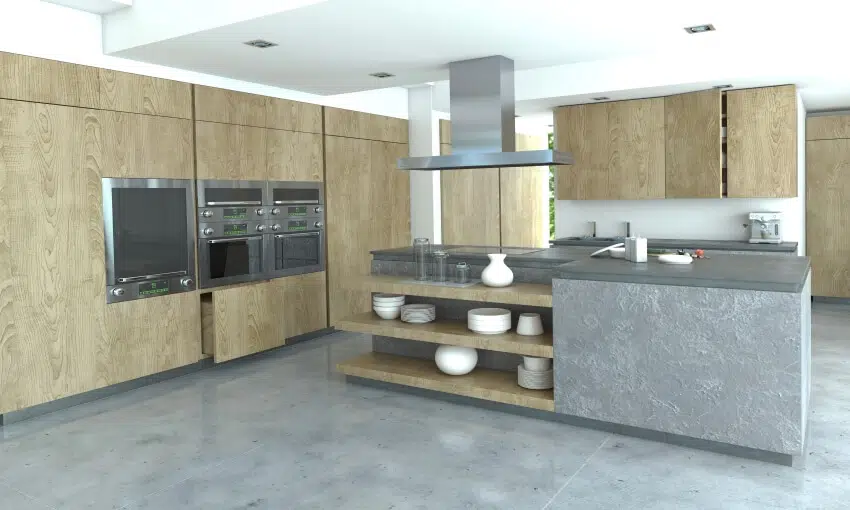 Kitchen with wood cabinets, concrete floor, and island with shelves and concrete finish countertop