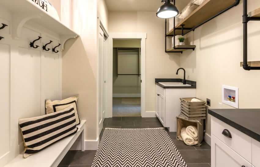 Room with shelves and mud bench on opposite wall