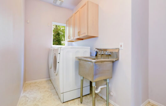 Laundy Room With Old Utility Sink And White Appliances Is 531x339 