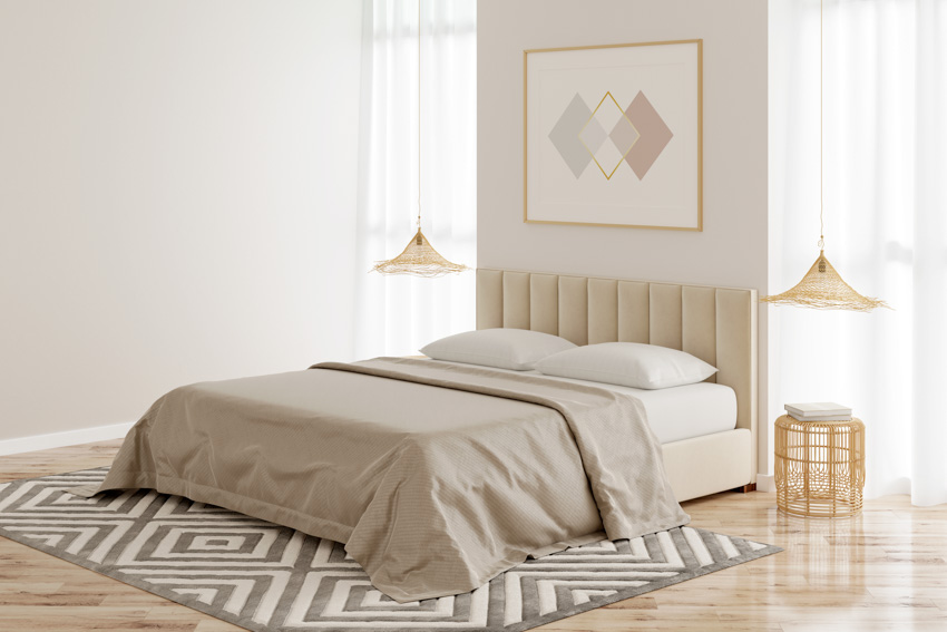 Minimalist bedroom with latex mattress, bedsheet, headboard, windows, carpet, and wood floor