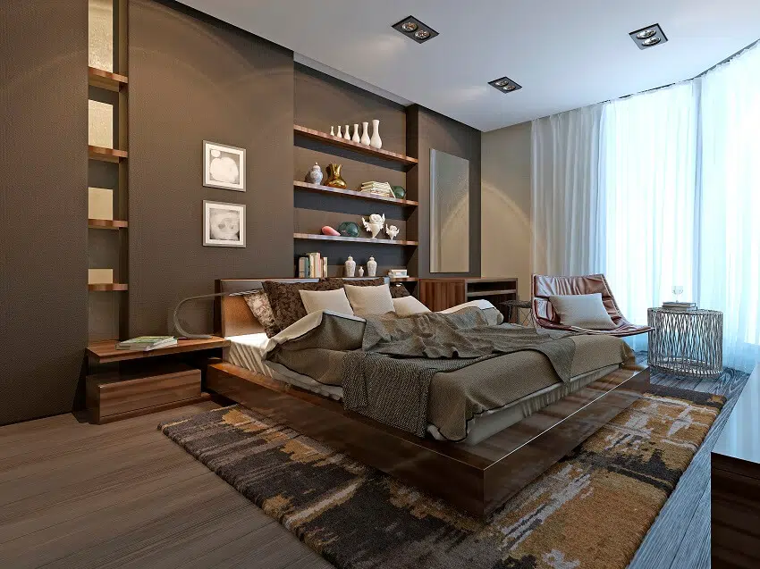 Beautiful modern bedroom with wooden floors, shelves and dark brown furniture