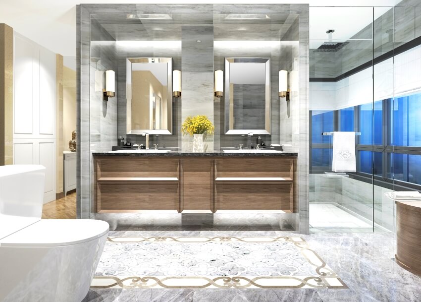 Modern gray bathroom with double vanity, decorative rug, and toilet