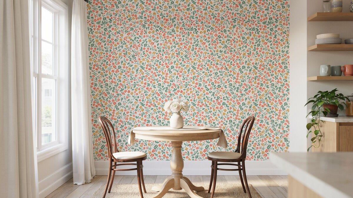 Bright dining nook with cheerful floral prepasted wallpaper and round pedestal table