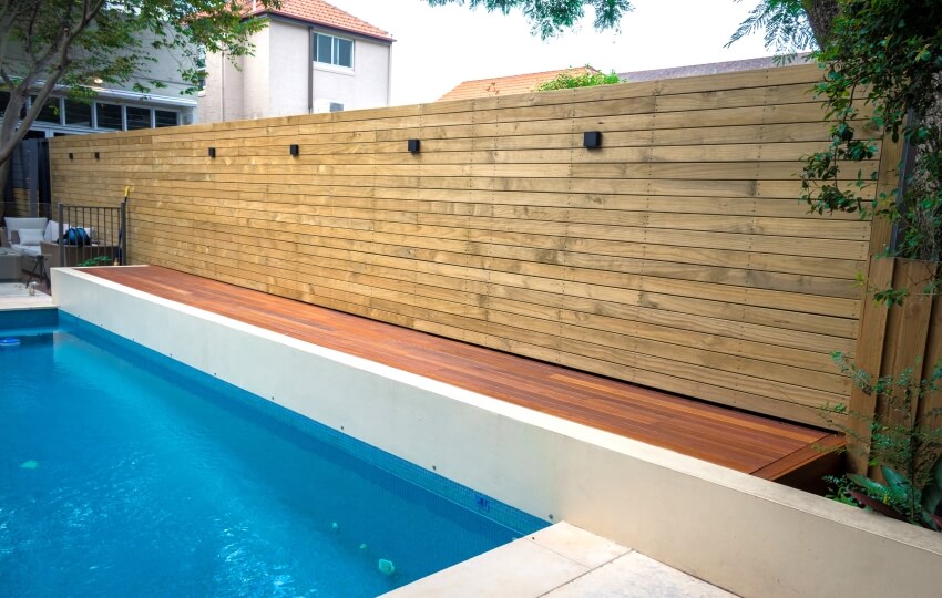 Timber deck fencing along the pool