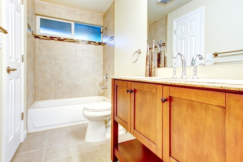 Interior with tile wall trim and solid wood vanity