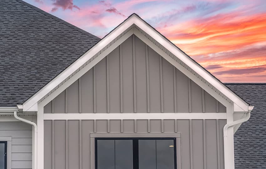 House board and batten siding with grey paint