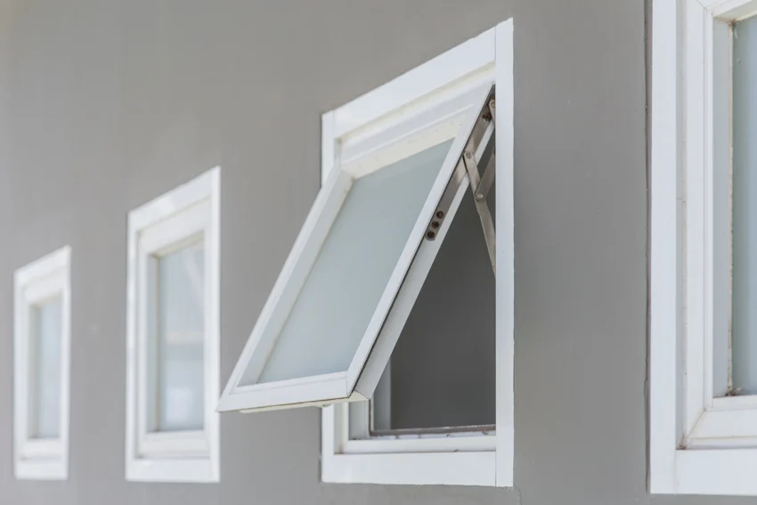 A series of awning egress glass hinged windows