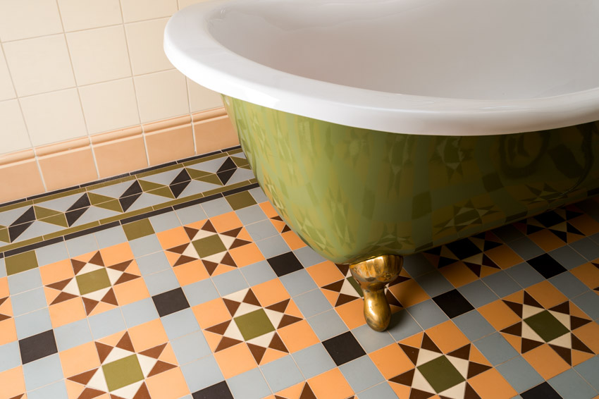 Bathroom with tub, and waterproof peel and stick floor tiles