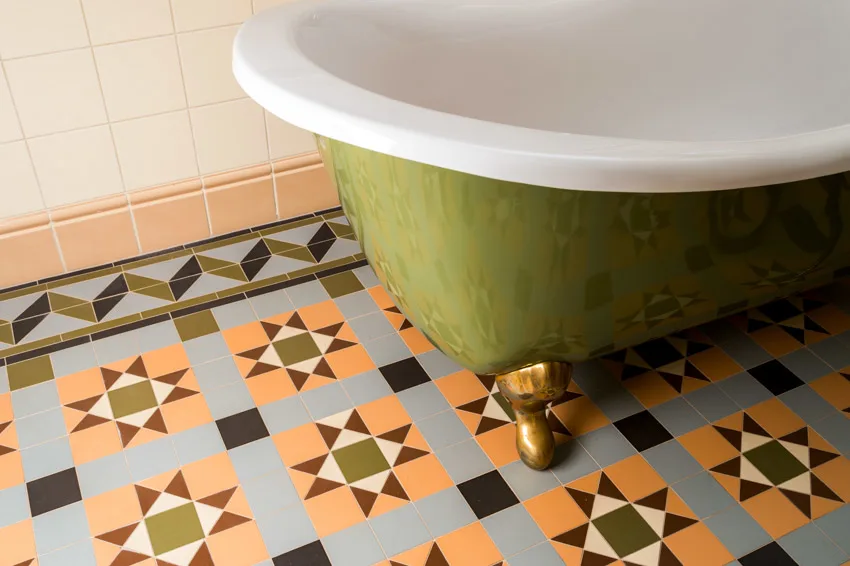 Bathroom with tub, and waterproof peel and stick floor tiles
