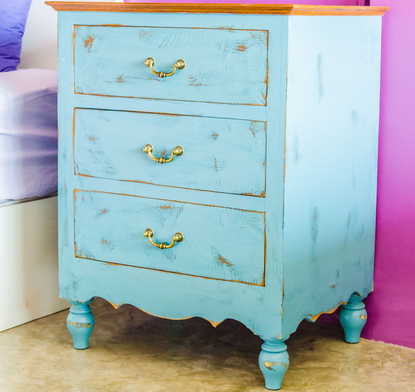 Bedroom with chalk paint nightstand, and epoxy flooring