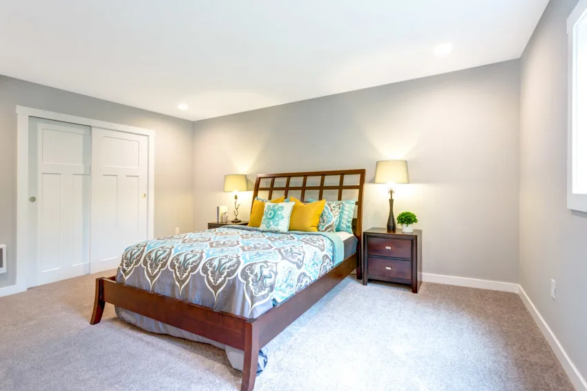Transitional bedroom layout with nightstand