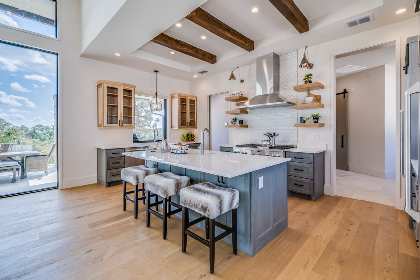 Bright kitchen area with cushioned faux fur stools