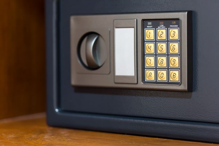 Closeup image of a safe with keypad